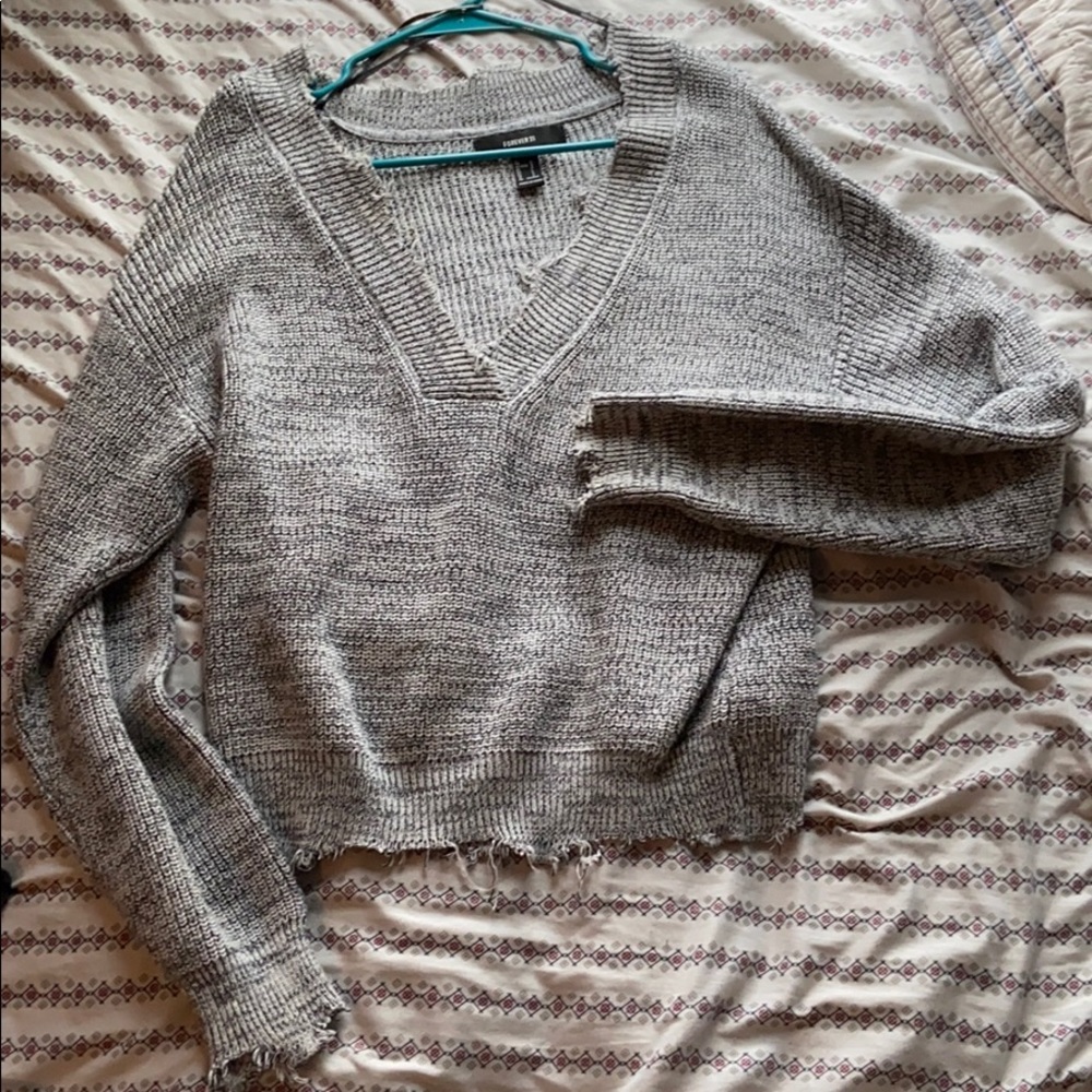 Distressed beach sweater